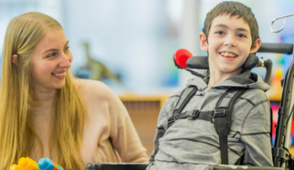 Young person with disability and support worker
