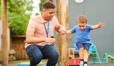 Early education worker and child